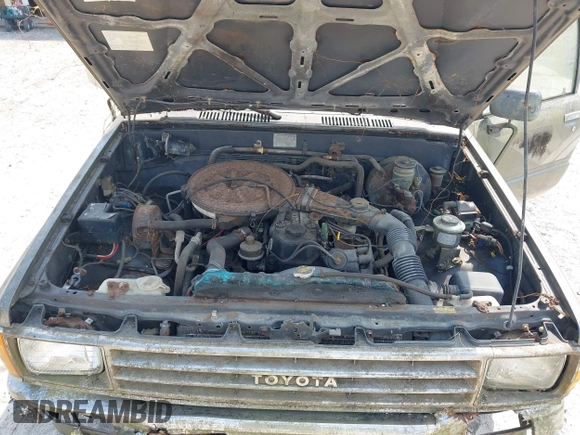 1988 Toyota Pickup with VIN JT4RN50R4J5146510, listed as a IAAI auction lot 42092308 with 288,420 mi miles and . Bid and sale history available at DreamBid. Image 10.