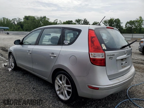 2009 Hyundai Elantra Touring z VIN KMHDC86E29U038194, wystawiony jako Copart lot #57483375 z przebiegiem 218 337 mil mil oraz Szkoda całkowita • Salvage title. Historia ofert i sprzedaży dostępna na DreamBid. Obrazek 2.