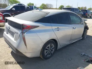 2017 Toyota Prius Two with VIN JTDKARFU9H3037028, listed as a IAAI auction lot 41808283 with 147,617 mi miles. Bid and sale history available at carsss.com. Image 4.