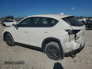2018 Mazda CX-5 Sport with VIN JM3KFBBMXJ0309289, listed as a Copart auction lot 48866565 with 64,040 mi miles and Salvage Title. Bid and sale history available at carsss.com. Image 2.