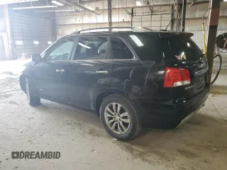2012 Kia Sorento SX with VIN 5XYKWDA26CG286059, listed as a Copart auction lot 51709925 with 0 mi miles and Clean Title. Bid and sale history available at carsss.com. Image 2.