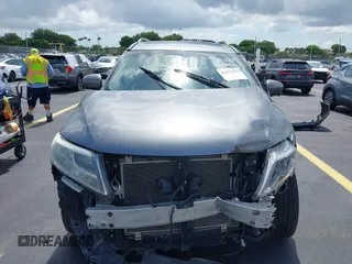 2015 Nissan Pathfinder Platinum with VIN 5N1AR2MMXFC668880, listed as a IAAI auction lot 42371231 with 101,173 mi miles and . Bid and sale history available at DreamBid. Image 13.