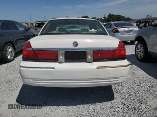 2000 Mercury Grand Marquis LS z VIN 2MEFM75W3YX689886, wystawiony jako Copart lot #54128735 z przebiegiem 54 819 mil mil oraz Szkoda całkowita • Salvage title. Historia ofert i sprzedaży dostępna na DreamBid. Obrazek 6.