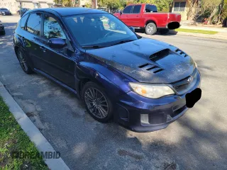 2012 Subaru WRX WRX Limited z VIN JF1GR7E65CG234890, wystawiony jako Copart lot #60362575 z przebiegiem 148 279 mil mil oraz Czysty tytuł • Clean title. Historia ofert i sprzedaży dostępna na DreamBid. Obrazek 1.