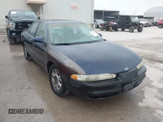 2000 Oldsmobile Intrigue GLS z VIN 1G3WX52H5YF182762, wystawiony jako IAAI lot #42273039 z przebiegiem 223 471 mil mil oraz . Historia ofert i sprzedaży dostępna na DreamBid. Obrazek 1.