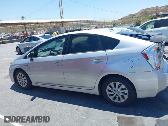 2014 Toyota Prius with VIN JTDKN3DP1E3051337, listed as a IAAI auction lot 42526207 with 306,478 mi miles and . Bid and sale history available at DreamBid. Image 14.
