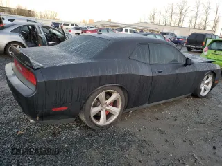 2010 Dodge Challenger SRT-8 with VIN 2B3CJ7DW8AH104011, listed as a Copart auction lot 87216334 with 55,519 mi miles and Salvage title. Bid and sale history available at DreamBid. Image 3.