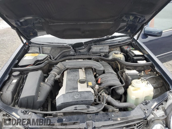 1997 Mercedes-Benz E-Class with VIN WDBJF55FXVJ027722, listed as a Copart auction lot 44835585 with 0 mi miles and Salvage Title. Bid and sale history available at carsss.com. Image 12.