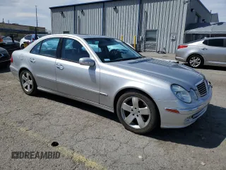 2003 Mercedes-Benz E-Class 5.0L with VIN WDBUF70J63A189963, listed as a Copart auction lot 50898675 with 130,264 mi miles and Salvage Title. Bid and sale history available at carsss.com. Image 4.