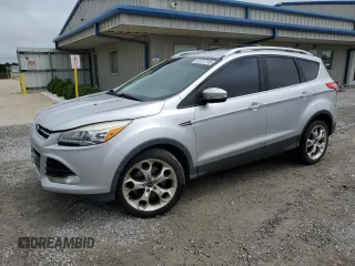 2014 Ford Escape Titanium с VIN 1FMCU0J9XEUC57032, выставлен на аукционе Copart как лот 60787295 с пробегом 191 665 миль миль и Списание • Salvage title. История ставок и продаж доступна на DreamBid. Изображение 1.