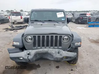 2018 Jeep Wrangler Unlimited Sport S with VIN 1C4HJXDN8JW203134, listed as a IAAI auction lot 42398860 with 103,801 mi miles and . Bid and sale history available at DreamBid. Image 11.