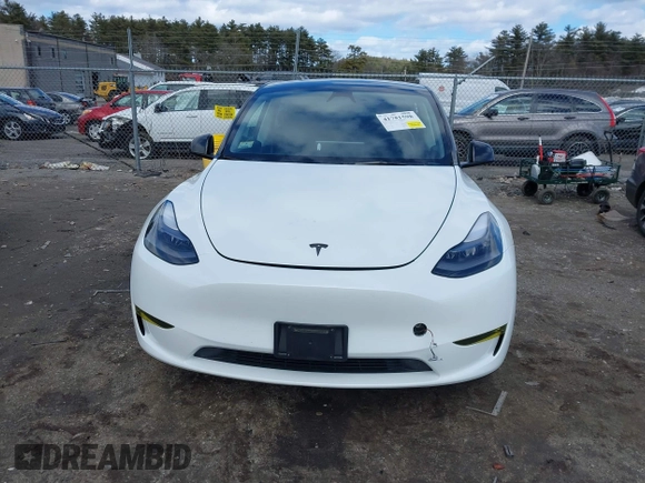 2023 Tesla Model Y Long Range with VIN 7SAYGDEE7PF832007, listed as a IAAI auction lot 41751598 with 14,126 mi miles and . Bid and sale history available at DreamBid. Image 12.