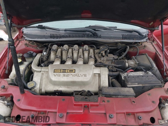 1997 Ford Taurus z VIN 1FALP54N7VA137035, wystawiony jako IAAI lot #41778551 z przebiegiem 137 025 mil mil oraz . Historia ofert i sprzedaży dostępna na DreamBid. Obrazek 10.