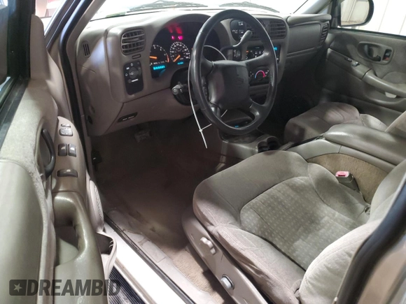 1999 Chevrolet Blazer LS with VIN 1GNCT18W8XK128169, listed as a Copart auction lot 44260965 with 104,790 mi miles and Salvage title. Bid and sale history available at DreamBid. Image 8.
