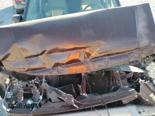 2000 Ford Explorer Eddie Bauer z VIN 1FMDU84P0YZB89831, wystawiony jako Copart lot #77874224 z przebiegiem 209 532 mil mil oraz Szkoda całkowita • Salvage title. Historia ofert i sprzedaży dostępna na DreamBid. Obrazek 13.