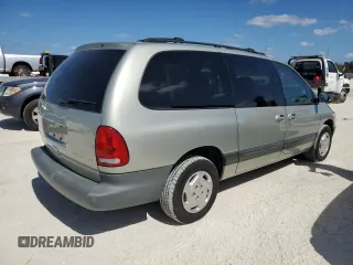 1999 Dodge Caravan SE with VIN 1B4GP44G5XB904043, listed as a Copart auction lot 77331804 with 105,141 mi miles and Clean Title. Bid and sale history available at carsss.com. Image 3.