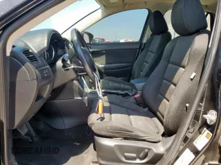2014 Mazda CX-5 Touring with VIN JM3KE2CY5E0316077, listed as a Copart auction lot 58218735 with 190,789 mi miles and Salvage title. Bid and sale history available at DreamBid. Image 7.