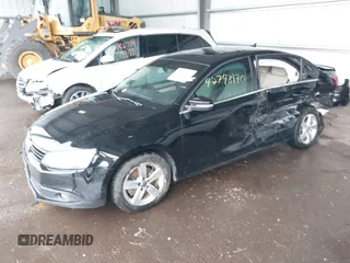 2012 Volkswagen Jetta TDI w/Premium & Nav with VIN 3VWLL7AJ8CM326549, listed as a IAAI auction lot 42748170 with 200,385 mi miles and . Bid and sale history available at DreamBid. Image 2.
