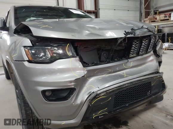 2018 Jeep Grand Cherokee Laredo E with VIN 1C4RJFAG6JC102969, listed as a IAAI auction lot 41963137 with 112,361 mi miles and . Bid and sale history available at DreamBid. Image 19.