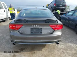 2012 Audi A7 Prestige с VIN WAU2GAFC7CN122113, выставлен на аукционе IAAI как лот 42111441 с пробегом 149 617 миль миль и . История ставок и продаж доступна на DreamBid. Изображение 16.