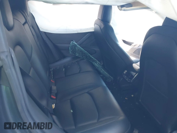 2018 Tesla Model 3 Long Range Battery with VIN 5YJ3E1EA7JF163401, listed as a IAAI auction lot 41829681 with 90,065 mi miles. Bid and sale history available at carsss.com. Image 8.