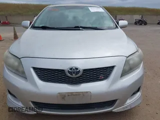 2009 Toyota Corolla with VIN 1NXBU40EX9Z028809, listed as a IAAI auction lot 42111892 with 156,182 mi miles. Bid and sale history available at carsss.com. Image 6.