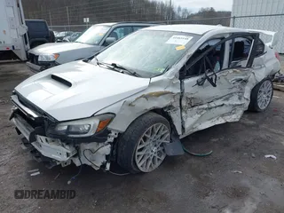 2016 Subaru WRX STI with VIN JF1VA2V63G9818135, listed as a IAAI auction lot 41465148 with 52,000 mi miles and . Bid and sale history available at DreamBid. Image 2.