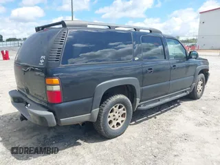 2004 Chevrolet Suburban Z71 z VIN 3GNFK16Z74G158523, wystawiony jako IAAI lot #42495502 z przebiegiem 303 931 mil mil oraz . Historia ofert i sprzedaży dostępna na DreamBid. Obrazek 4.