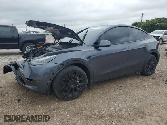 2023 Tesla Model Y Long Range z VIN 7SAYGDEE4PF752292, wystawiony jako Copart lot #53824185 z przebiegiem 61 470 mil mil oraz Szkoda całkowita • Salvage title. Historia ofert i sprzedaży dostępna na DreamBid. Obrazek 1.