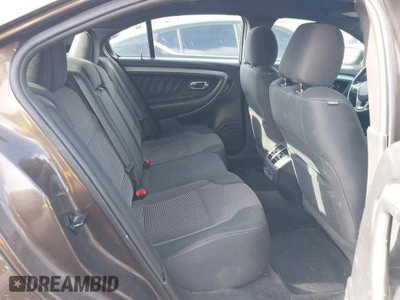 2015 Ford Taurus SEL with VIN 1FAHP2E87FG194170, listed as a IAAI auction lot 42184749 with 222,609 mi miles and . Bid and sale history available at carsss.com. Image 8.