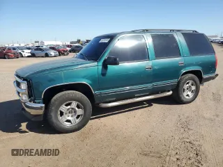 1999 Chevrolet Tahoe Z71 z VIN 1GNEK13R7XR103834, wystawiony jako Copart lot #56724045 z przebiegiem 222 907 mil mil oraz Szkoda całkowita • Salvage title. Historia ofert i sprzedaży dostępna na DreamBid. Obrazek 1.