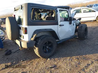 2015 Jeep Wrangler Sport with VIN 1C4AJWAG0FL516351, listed as a IAAI auction lot 41178594 with 49,700 mi miles and . Bid and sale history available at DreamBid. Image 4.