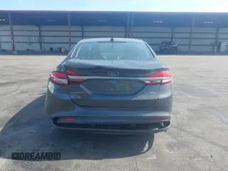 2017 Ford Fusion SE z VIN 3FA6P0H76HR259097, wystawiony jako IAAI lot #42133090 z przebiegiem 187 400 mil mil oraz . Historia ofert i sprzedaży dostępna na DreamBid. Obrazek 16.
