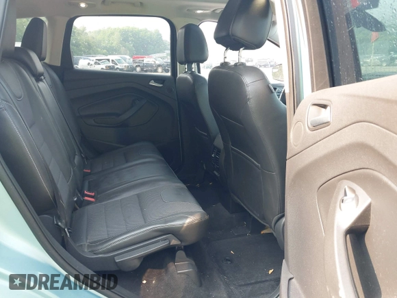 2013 Ford Escape Titanium with VIN 1FMCU9J99DUD63037, listed as a IAAI auction lot 42436605 with 168,200 mi miles and . Bid and sale history available at DreamBid. Image 8.