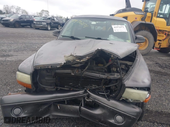 2002 Dodge Dakota with VIN 1B7FL16X62S683972, listed as a IAAI auction lot 41972271 with 158,436 mi miles and . Bid and sale history available at carsss.com. Image 6.