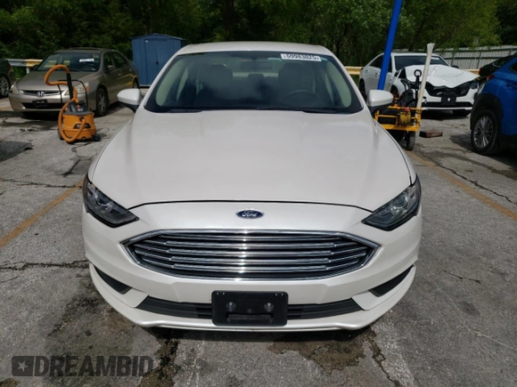 2018 Ford Fusion SE z VIN 3FA6P0HD9JR183760, wystawiony jako Copart lot #59983025 z przebiegiem 95 206 mil mil oraz Szkoda całkowita • Salvage title. Historia ofert i sprzedaży dostępna na DreamBid. Obrazek 5.