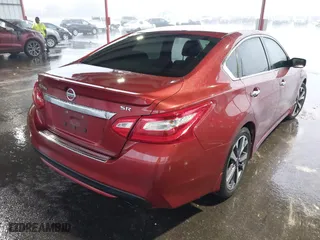 2016 Nissan Altima 2.5 SL with VIN 1N4AL3AP2GC211238, listed as a IAAI auction lot 39144309 with 102,669 mi miles. Bid and sale history available at carsss.com. Image 4.