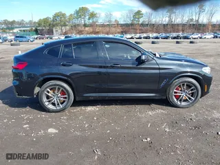 2021 BMW X4 M40i with VIN 5UX2V5C03M9H54824, listed as a IAAI auction lot 41817714 with 34,880 mi miles. Bid and sale history available at carsss.com. Image 13.
