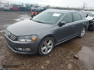 2014 Volkswagen Passat TDI SE w/Sunroof with VIN 1VWBN7A39EC085032, listed as a IAAI auction lot 41931302 with 193,425 mi miles. Bid and sale history available at carsss.com. Image 18.