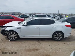 2012 Kia Optima SX with VIN 5XXGR4A60CG058689, listed as a IAAI auction lot 41774004 with 169,831 mi miles. Bid and sale history available at carsss.com. Image 14.