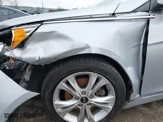 2013 Hyundai Sonata SE with VIN 5NPEC4AC4DH710329, listed as a IAAI auction lot 41849429 with 104,607 mi miles. Bid and sale history available at carsss.com. Image 12.