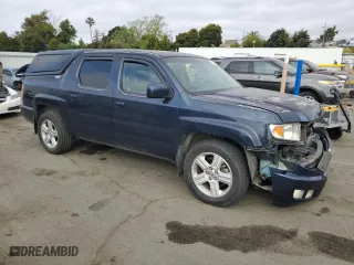 2010 Honda Ridgeline RTL with VIN 5FPYK1F50AB005120, listed as a Copart auction lot 53569115 with 173,878 mi miles and Salvage Title. Bid and sale history available at carsss.com. Image 4.
