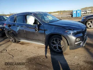 2019 BMW X1 xDrive28i with VIN WBXHT3C50K3H35538, listed as a Copart auction lot 70726232 with 27,847 mi miles. Bid and sale history available at carsss.com. Image 4.