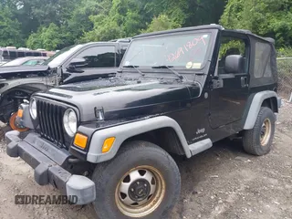 2004 Jeep Wrangler SE with VIN 1J4FA291X4P800973, listed as a IAAI auction lot 42691809 with 116,942 mi miles and . Bid and sale history available at DreamBid. Image 2.
