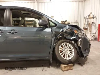 2014 Toyota Sienna XLE с VIN 5TDYK3DC5ES423745, выставлен на аукционе IAAI как лот 42455273 с пробегом 103 063 миль миль и . История ставок и продаж доступна на DreamBid. Изображение 18.
