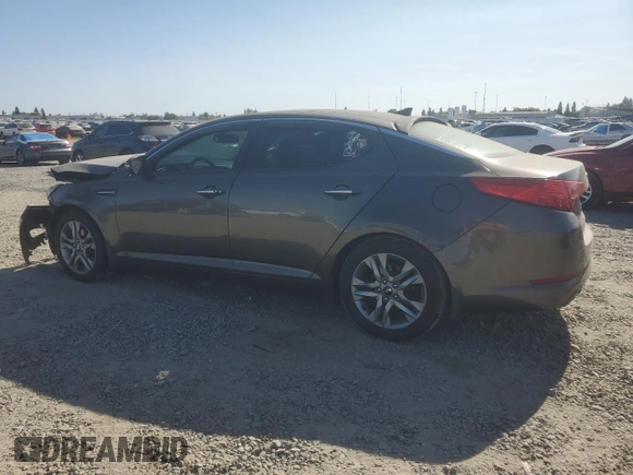 2013 Kia Optima EX z VIN 5XXGN4A77DG199443, wystawiony jako Copart lot #62406035 z przebiegiem 171 081 mil mil oraz Szkoda całkowita • Salvage title. Historia ofert i sprzedaży dostępna na DreamBid. Obrazek 2.