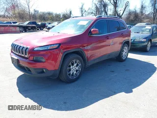 2015 Jeep Cherokee Latitude with VIN 1C4PJMCB6FW714656, listed as a IAAI auction lot 41887261 with 131,600 mi miles and . Bid and sale history available at carsss.com. Image 2.