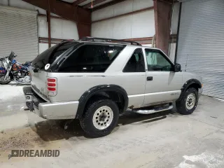 2000 Chevrolet Blazer LS z VIN 1GNCT18W9YK188091, wystawiony jako Copart lot #78592844 z przebiegiem 69 497 mil mil oraz Szkoda całkowita • Salvage title. Historia ofert i sprzedaży dostępna na DreamBid. Obrazek 3.