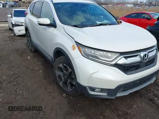 2017 Honda CR-V Touring with VIN 5J6RW2H92HL040217, listed as a IAAI auction lot 41044193 with 180,842 mi miles. Bid and sale history available at carsss.com. Image 1.