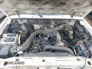 1998 Mazda B-Series 2WD Truck SX with VIN 4F4YR12C1WTM04588, listed as a IAAI auction lot 41563617 with 348,698 mi miles. Bid and sale history available at carsss.com. Image 10.
